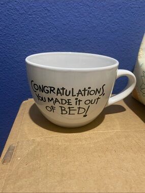 White Ceramic Mug with 'Congratulations, You Made It Out of Bed!' Message